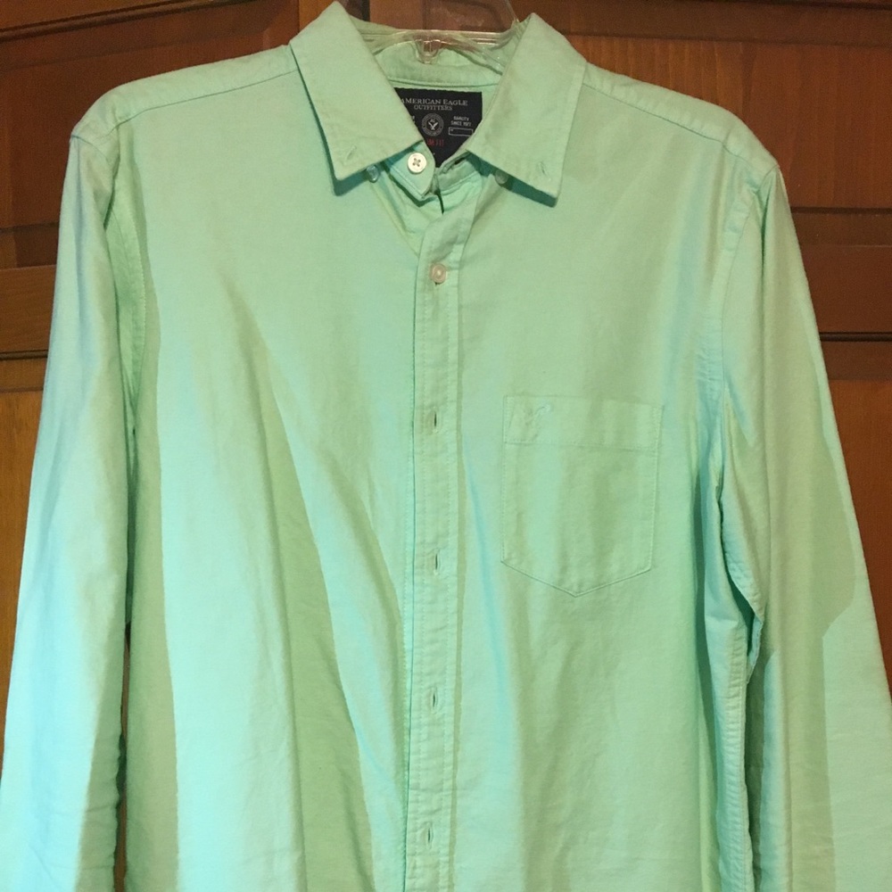 Green button down shirt